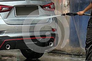 Car washing with using High Pressure Water., Close up concept