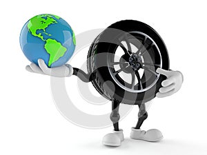 Car wheel character holding world globe
