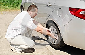 Car wheel defect man change puncture