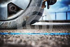 Car wheel on the ground