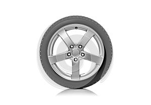 The car wheel is isolated against a white background.