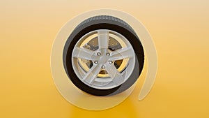 Car wheel isolated on yellow background. Alloy wheels tire auto. Minimalist creative concept. 3d illustration