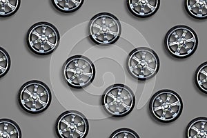 Car wheels on a gray background. Transport. Spare parts. Sale auto wheels.