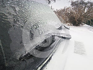 Car whipers covered by ice.