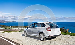 A car of white color,in the mountains near the coast of the Costa Brava of the Mediterranean Sea in Spain, Catalonia