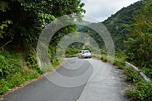 Car on a winding mountain road