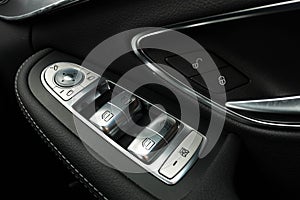 Car window control buttons.