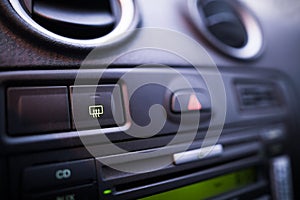 Car window defrost button detail