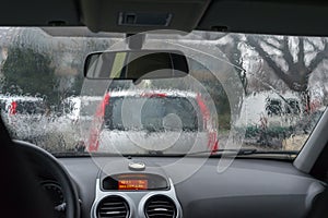 Car window with rain drops