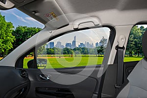 Car window view of Central Park, Manhattan, New York, USA