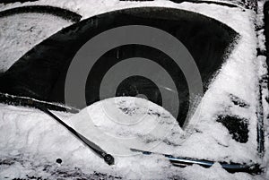 Car windshield with snow