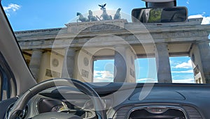 Car windshield with view of Brandenburg Gate, Berlin, Germany