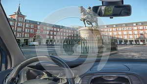 Car windshield with view of Plaza Mayor, Madrid, Spain