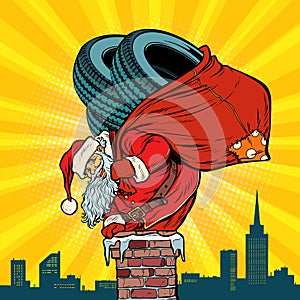 Car winter tires. Santa Claus with gifts climbs into the chimney