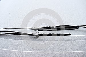 Car wipers covered with snow