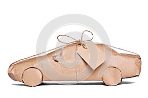 Car wrapped in brown paper cut out