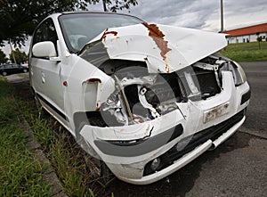 Car wreck with damage on front side