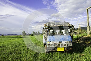 Car wreck on fields photo