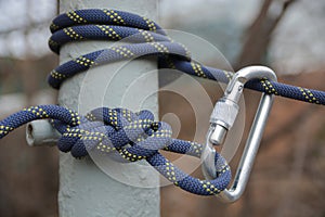 Carabine and climbing rope in knot