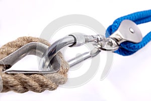 Carabiner, rope and sailing pulley. Accessories used on a deep sea yacht