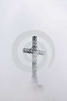 Caraiman Cross in the fog photo