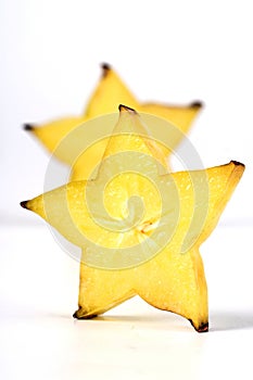 Carambola on white background - slices