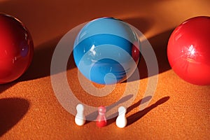 Carambole billiard blue ball on the table playing surface