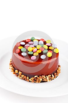 Caramel cake with candies