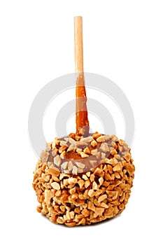 Caramel coated apple with nuts isolated on white