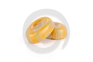 Caramel cream candy butterscotch isolated on white