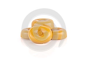 Caramel cream candy butterscotch isolated on white