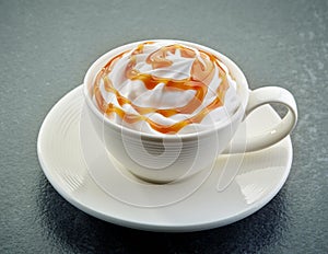 Caramel latte coffee with whipped cream