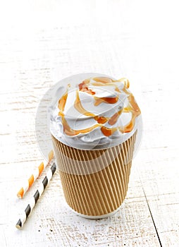 Caramel latte coffee with whipped cream