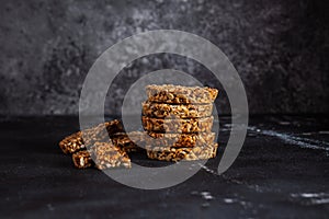 Caramel peanut brittle from sunflower seeds and sesame seeds and fitness cookies with flax seeds