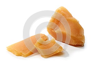 Caramel pieces on white background