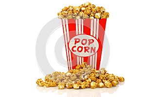 Caramel popcorn in a decorative paper popcorn cup