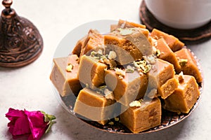 Caramel sherbet with pistachious and turkish coffee photo