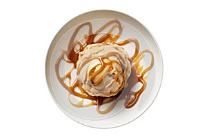 Caramel Swirl Ice Cream On White Plate, On White Background photo