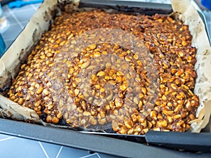 Caramel toffee chocolate cake topping with cashew nut in homemade