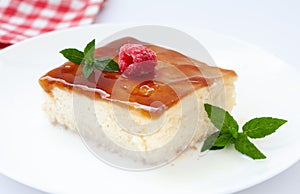 Caramel trilece dessert on white background
