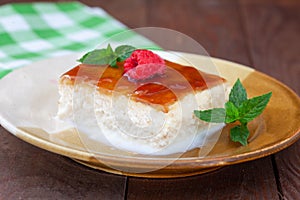 Caramel trilece dessert on wooden background