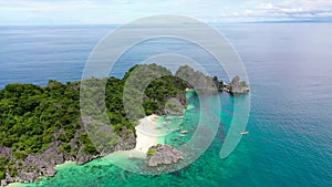 Caramoan Islands, Camarines Sur, Matukad, Philippines. Tropical island with a white sandy beach.