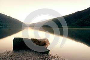 Caras Severin County, Romania, January 2019: Lake Poiana Marului covered in fog early in the morning