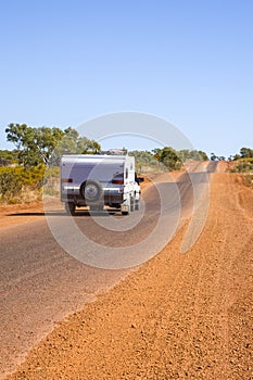 Caravan Being Towed on Outback Road in Australia
