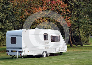 Caravan on campsite in Autumn