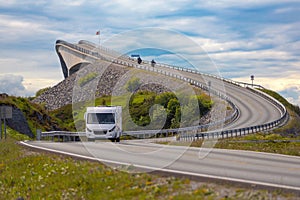 Caravan car RV travels on the highway Atlantic Ocean Road Norway