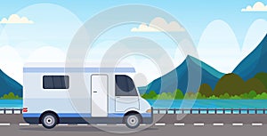 Caravan car traveling on highway recreational travel vehicle camping concept beautiful nature river mountains landscape