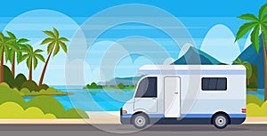 Caravan car traveling on highway recreational travel vehicle camping summer vacation concept tropical island sea beach