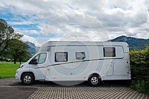 Caravan car vacation. Family vacation travel RV. Holiday trip in motorhome. Switzerland natural landscape photo
