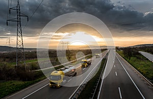 Caravan or convoy of tank trucks on highway